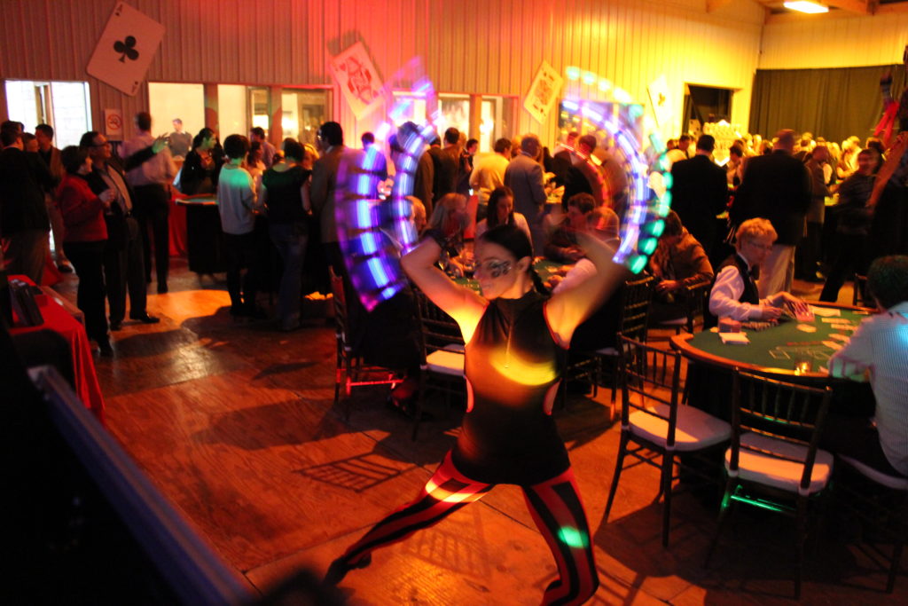 A person with lights in their hands and arms